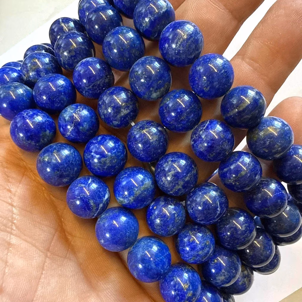 Lapis Lazuli Dizi 12 mm İncele ve Satın Al Lapis Lazuli Dizi 12 mm - Orijinal Doğal Taş ve Şifa Kristali Görsel 1