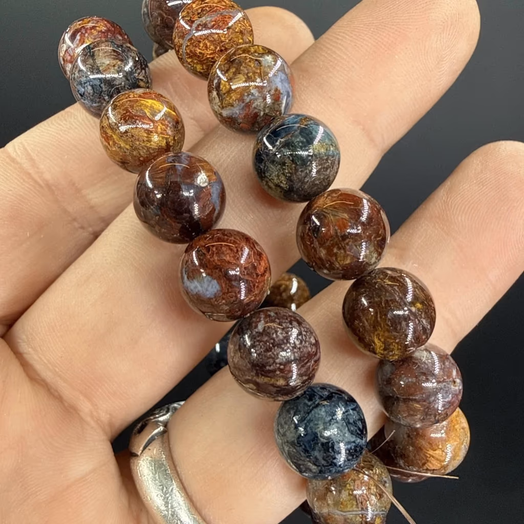 Pietersite Bileklik 10 mm İncele ve Satın Al Pietersite Bileklik 10 mm - Orijinal Doğal Taş ve Şifa Kristali Görsel 1