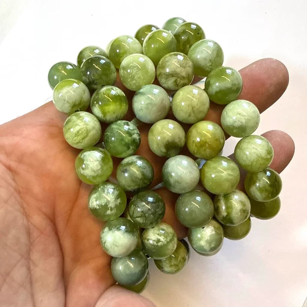 Yeşim Bileklik AAA 12 mm İncele ve Satın Al Yeşim Bileklik AAA 12 mm - Orijinal Doğal Taş ve Şifa Kristali Görsel 1