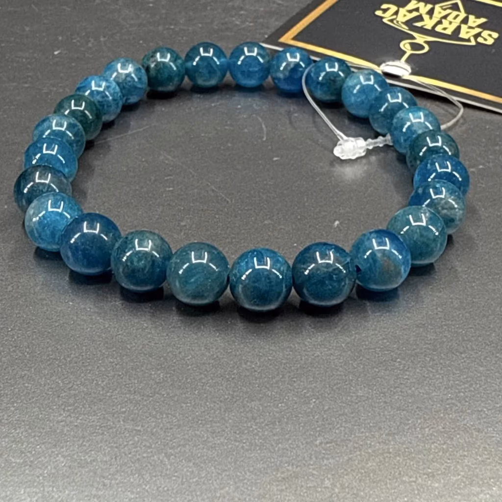 Blue Apatit A+ Bileklik 8 mm İncele ve Satın Al Blue Apatit A+ Bileklik 8 mm - Orijinal Doğal Taş ve Şifa Kristali Görsel 1