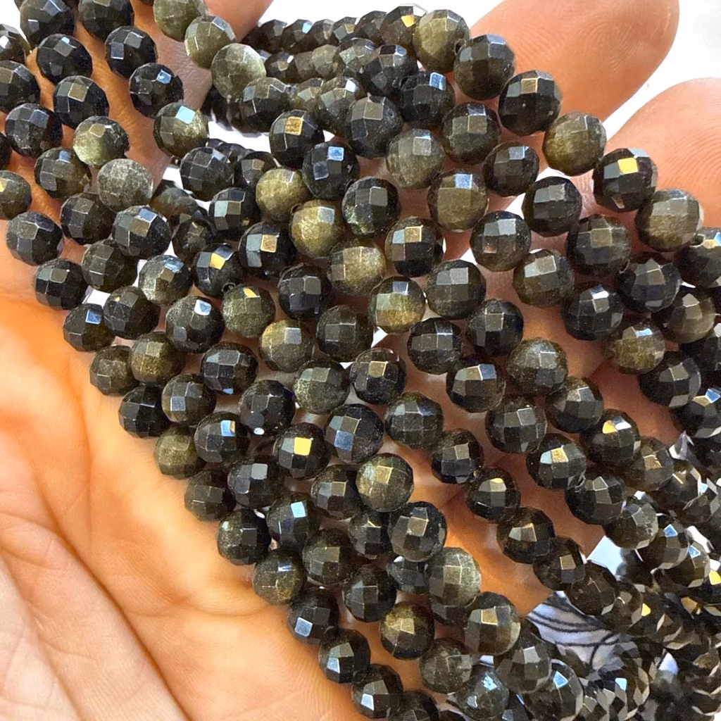 Dizi Obsidiyen Faset 6 mm İncele ve Satın Al Dizi Obsidiyen Faset 6 mm - Orijinal Doğal Taş ve Şifa Kristali Görsel 1