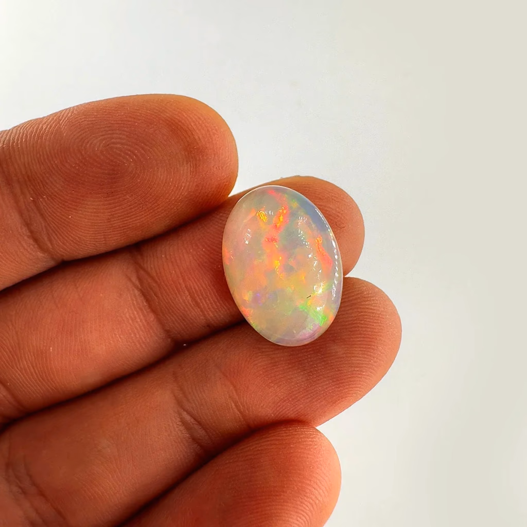 Etiopya Opal Kabaşon 6A+ K074 İncele ve Satın Al Etiopya Opal Kabaşon 6A+ K074 - Orijinal Doğal Taş ve Şifa Kristali Görsel 1