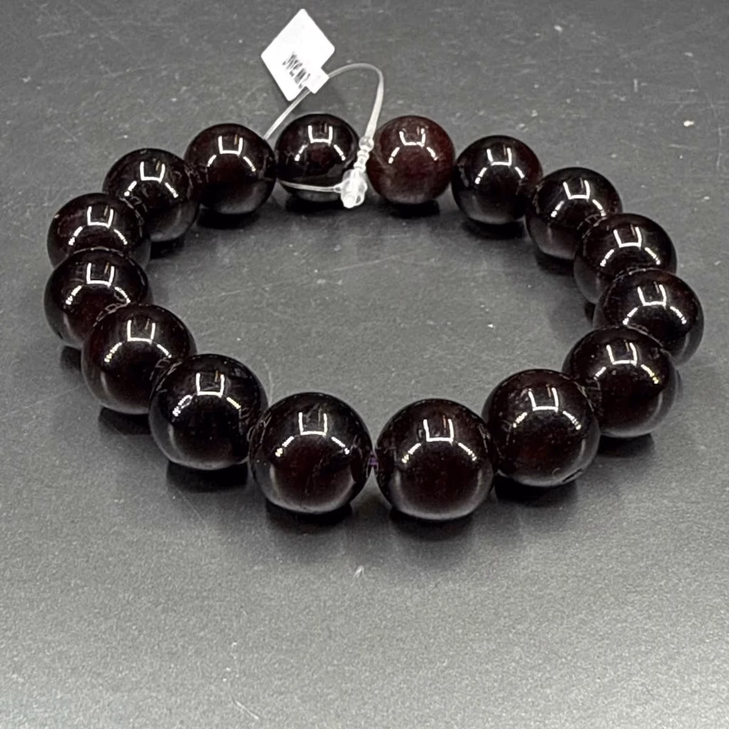 Garnet Bileklik 12 mm - Büyütmek için tıklayın Garnet Bileklik 12 mm - Orijinal Doğal Taş ve Şifa Kristali Görsel 1