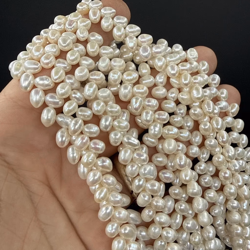 İnci Damla Beyaz 5 mm İncele ve Satın Al İnci Damla Beyaz 5 mm - Orijinal Doğal Taş ve Şifa Kristali Görsel 1