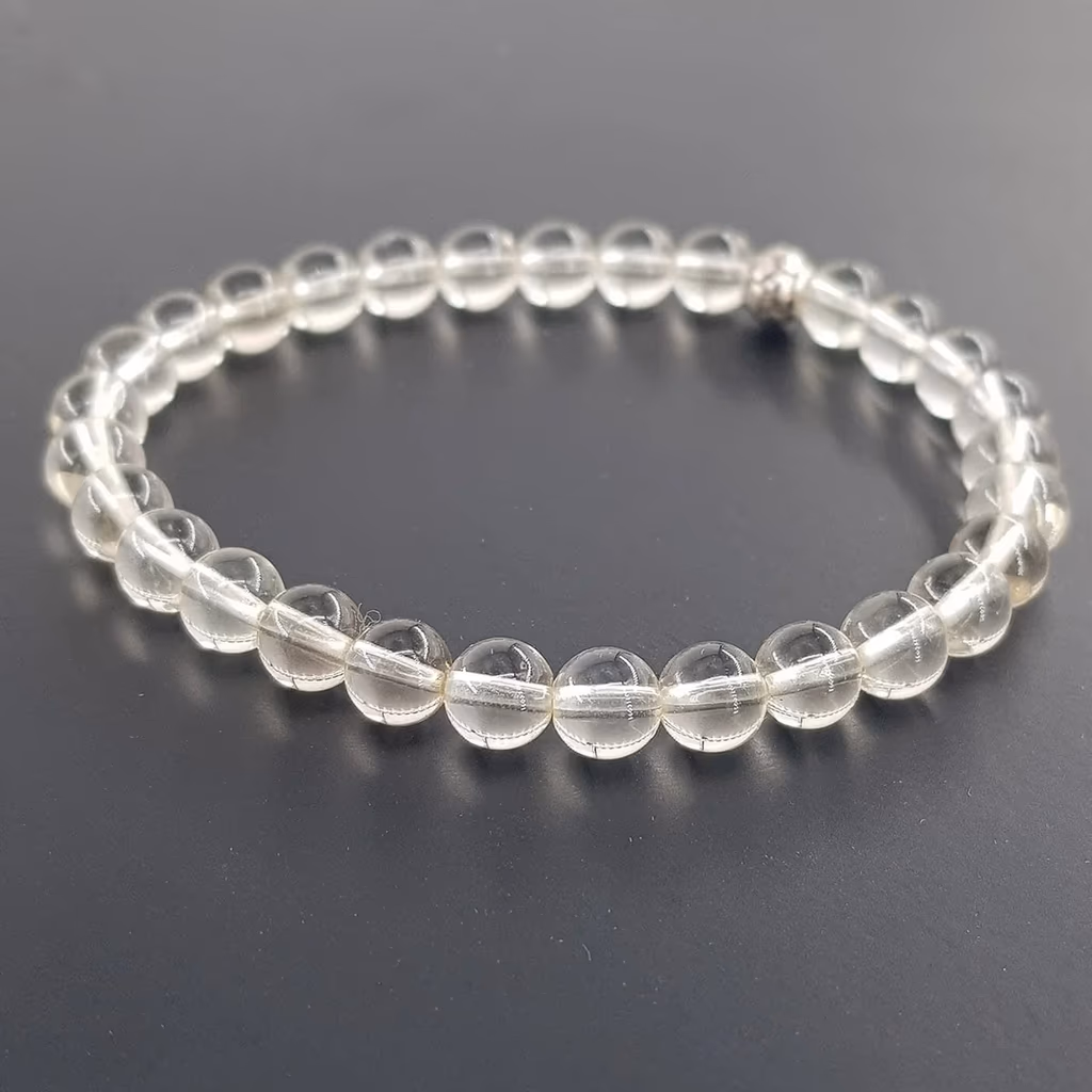 Kristal Kuvars Bileklik 6mm İncele ve Satın Al Kristal Kuvars Bileklik 6mm - Orijinal Doğal Taş ve Şifa Kristali Görsel 1