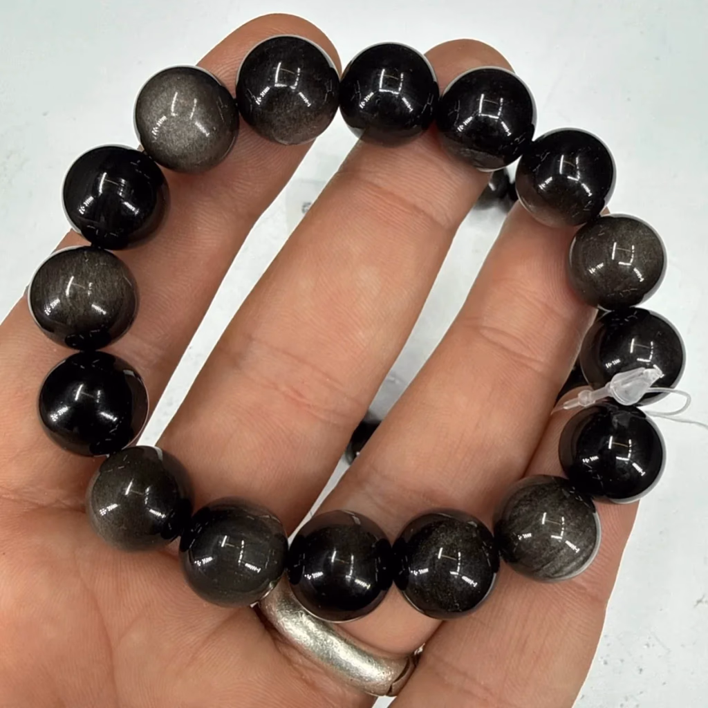 Obsidiyen Bileklik 12mm İncele ve Satın Al Obsidiyen Bileklik 12mm - Orijinal Doğal Taş ve Şifa Kristali Görsel 1