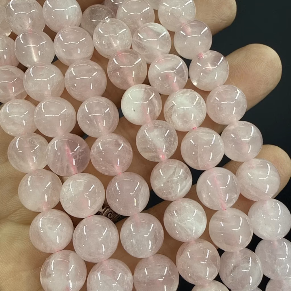 Pembe Kuvars Dizi 10 mm İncele ve Satın Al Pembe Kuvars Dizi 10 mm - Orijinal Doğal Taş ve Şifa Kristali Görsel 1