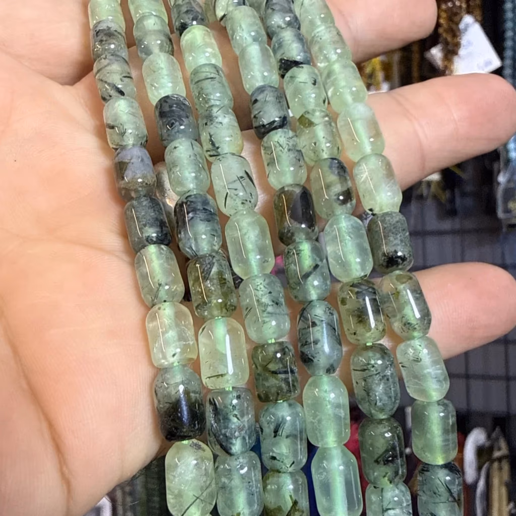 Prehnite Kapsül Dizi 6x9 mm İncele ve Satın Al Prehnite Kapsül Dizi 6x9 mm - Orijinal Doğal Taş ve Şifa Kristali Görsel 1