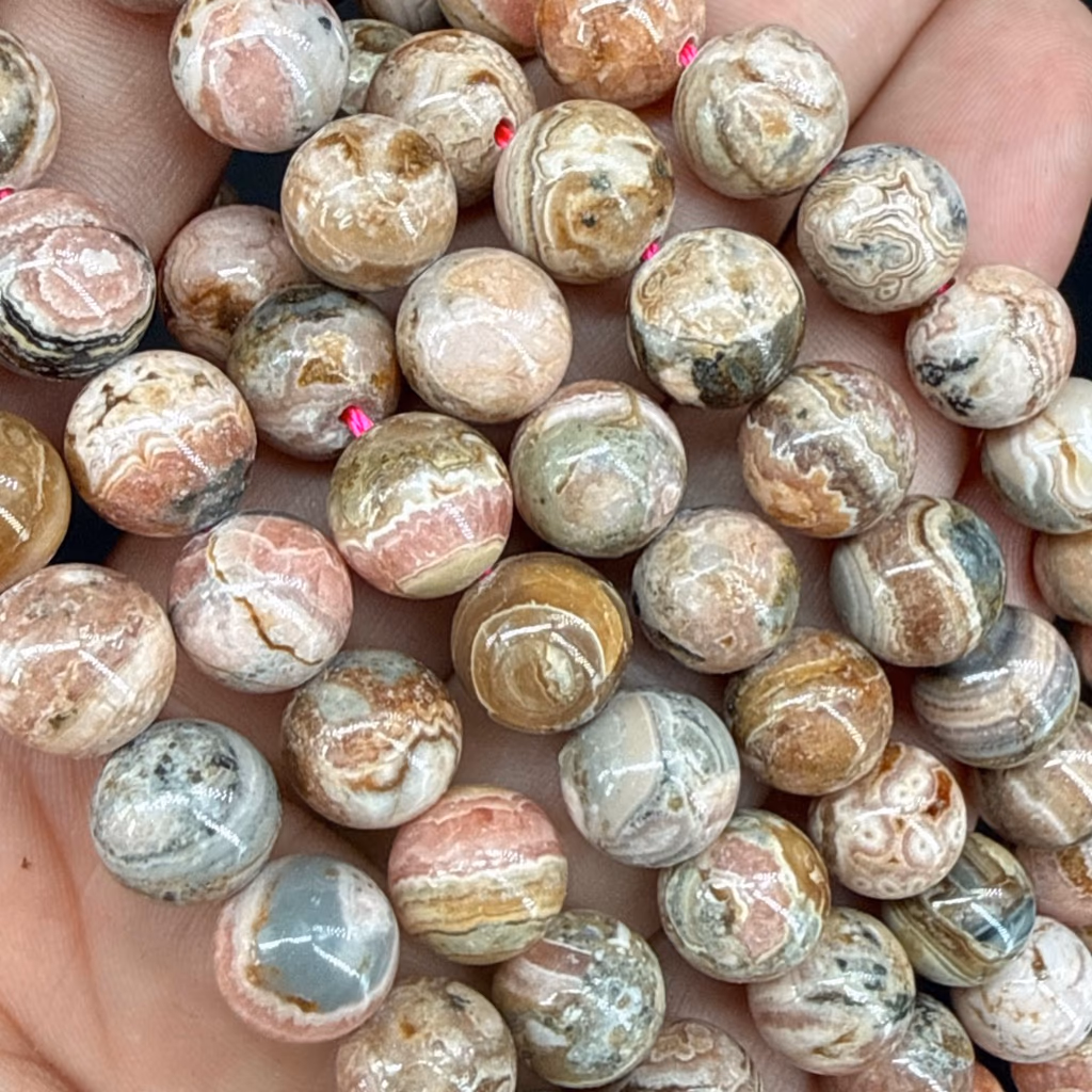 Rodokrozit Dizi 10mm AAA İncele ve Satın Al Rodokrozit Dizi 10mm AAA - Orijinal Doğal Taş ve Şifa Kristali Görsel 1