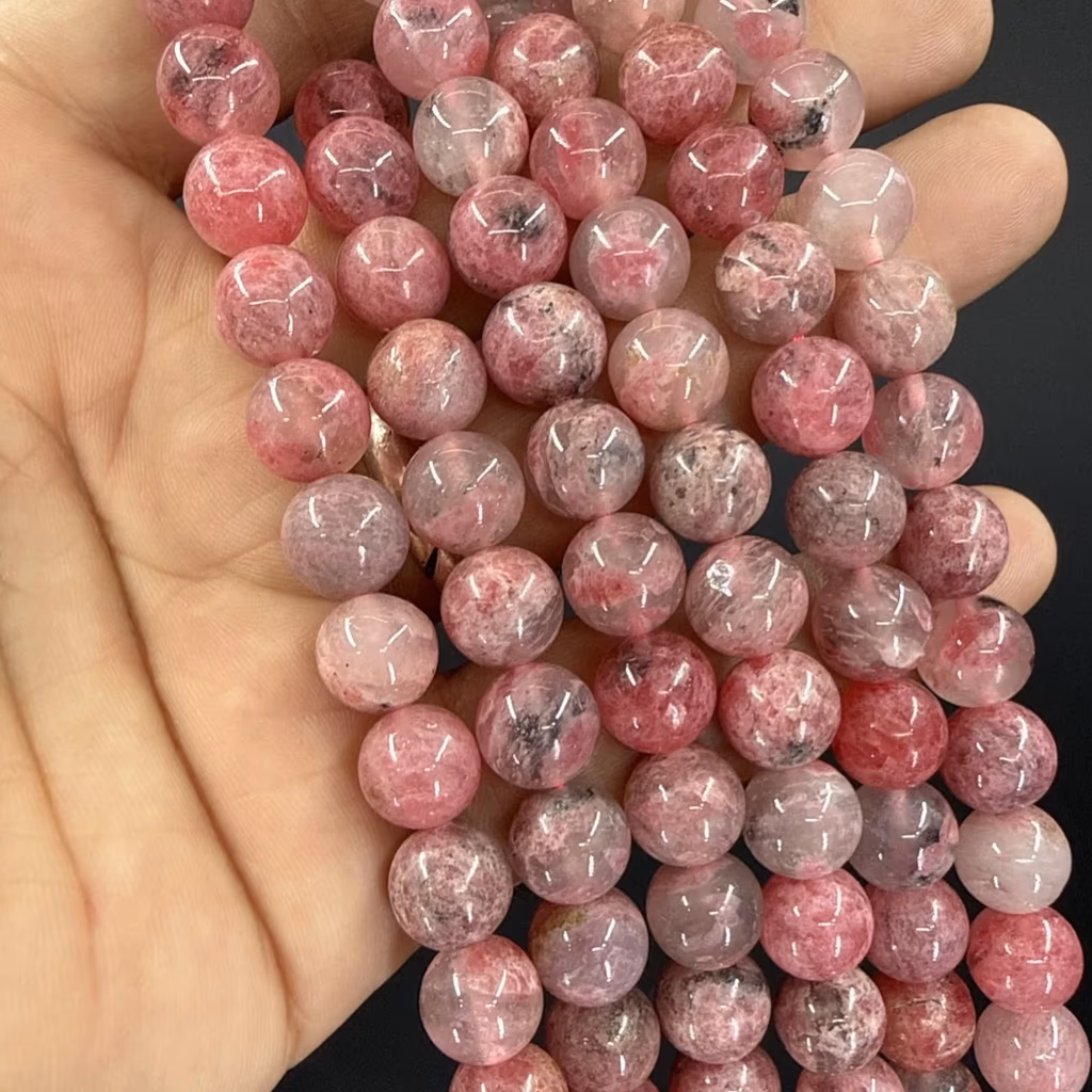 Sakura Rodonit Dizi 10 mm İncele ve Satın Al Sakura Rodonit Dizi 10 mm - Orijinal Doğal Taş ve Şifa Kristali Görsel 1