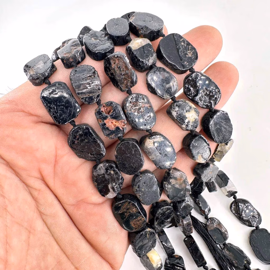 Siyah Turmalin Dizi 15x12x5mm İncele ve Satın Al Siyah Turmalin Dizi 15x12x5mm - Orijinal Doğal Taş ve Şifa Kristali Görsel 1