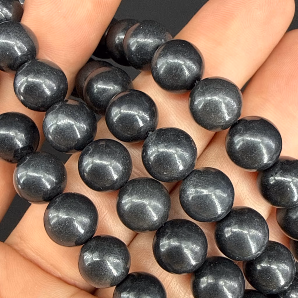 Şungit Dizi 10mm İncele ve Satın Al Şungit Dizi 10mm - Orijinal Doğal Taş ve Şifa Kristali Görsel 1