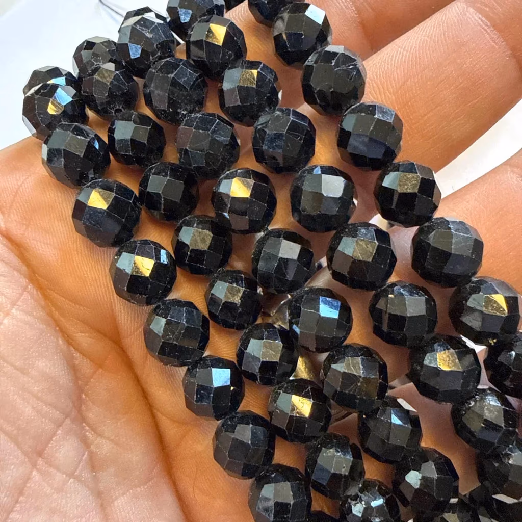 Turmalin Faset Dizi 8 mm İncele ve Satın Al Turmalin Faset Dizi 8 mm - Orijinal Doğal Taş ve Şifa Kristali Görsel 1
