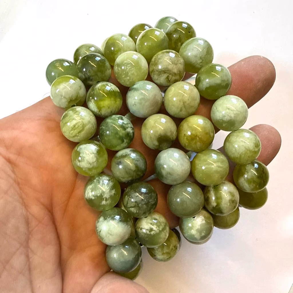 Yeşim Bileklik AAA 12 mm İncele ve Satın Al Yeşim Bileklik AAA 12 mm - Orijinal Doğal Taş ve Şifa Kristali Görsel 1