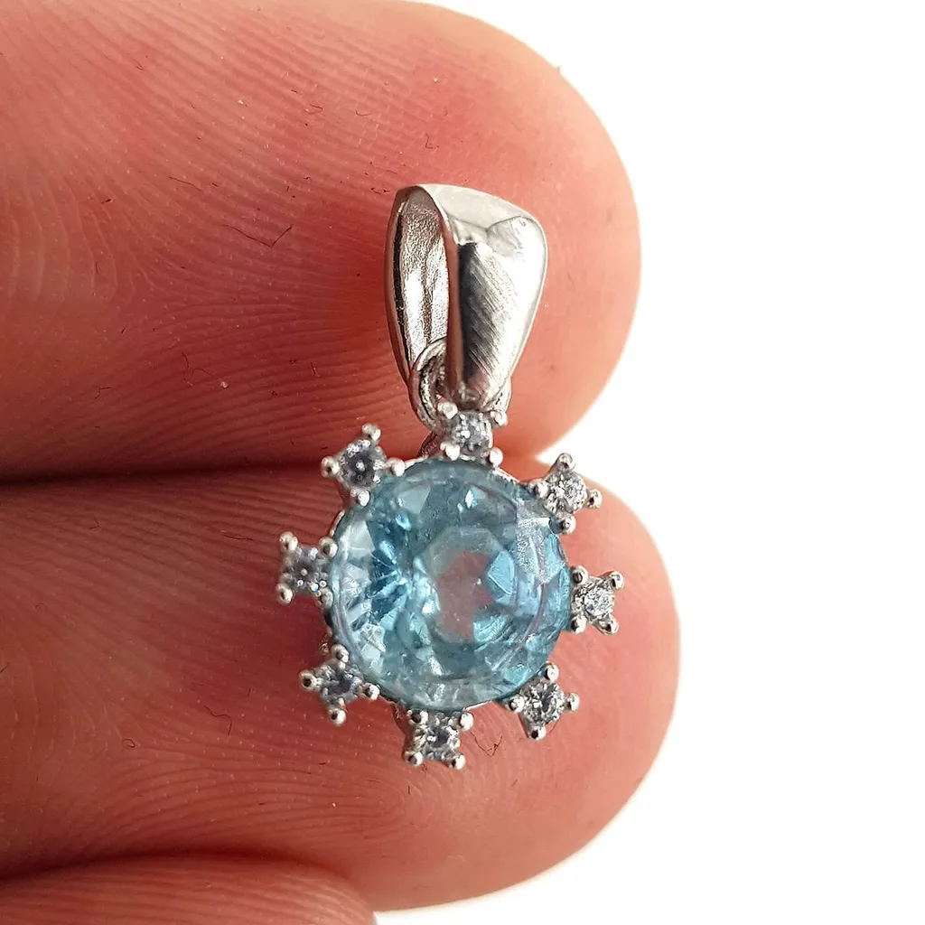 Topaz Kolye Ucu (Gümüş) Topaz Kolye Ucu (Gümüş) - Topaz Taşı Enerjisi ve Doğal Formu